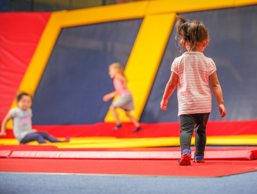 Kids playing at trampoline park